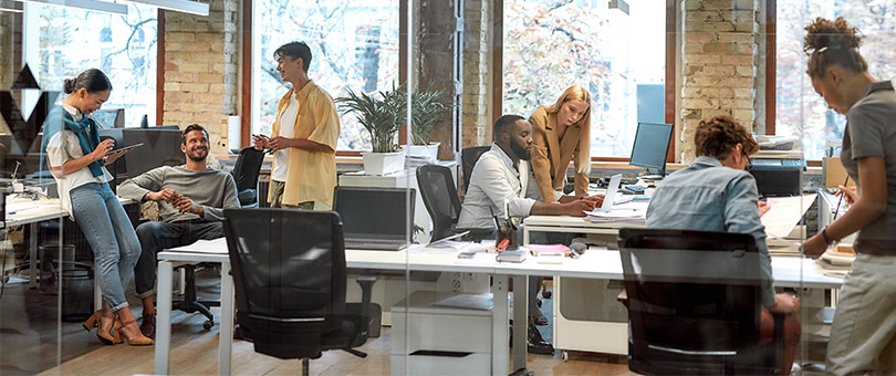 a group of people in a modern office