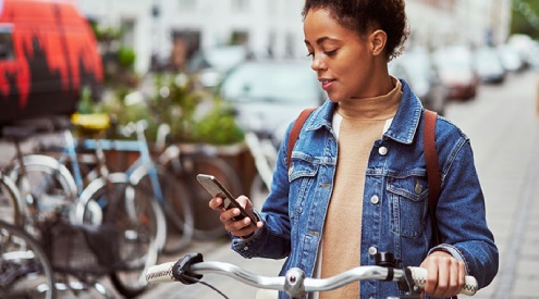 A woman looking at her phone