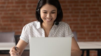 A woman working on her laptop