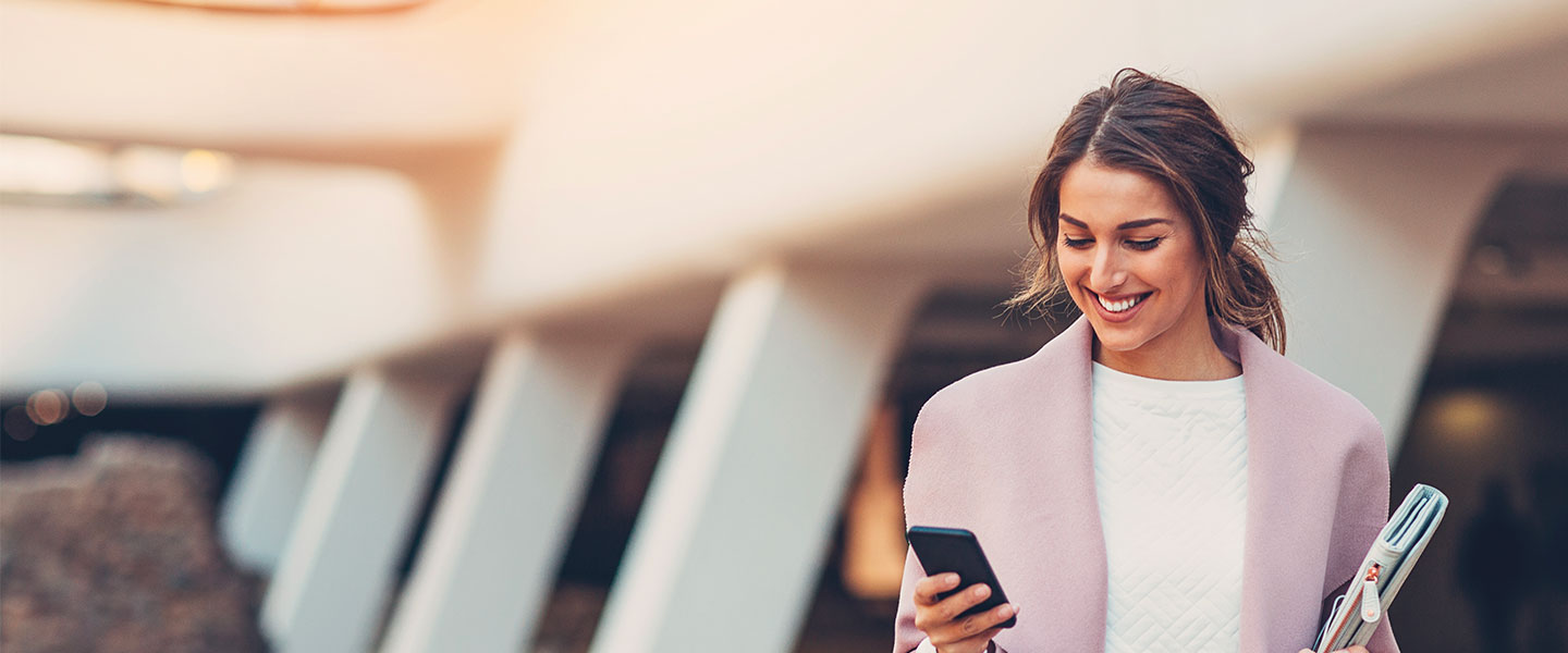 a woman holding a tablet